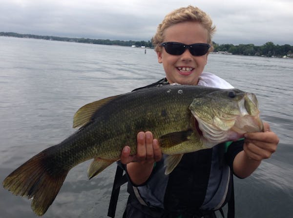 Brad (Squid) Little, 8, of Plymouth with a 5-pound, 6-ounce bass.