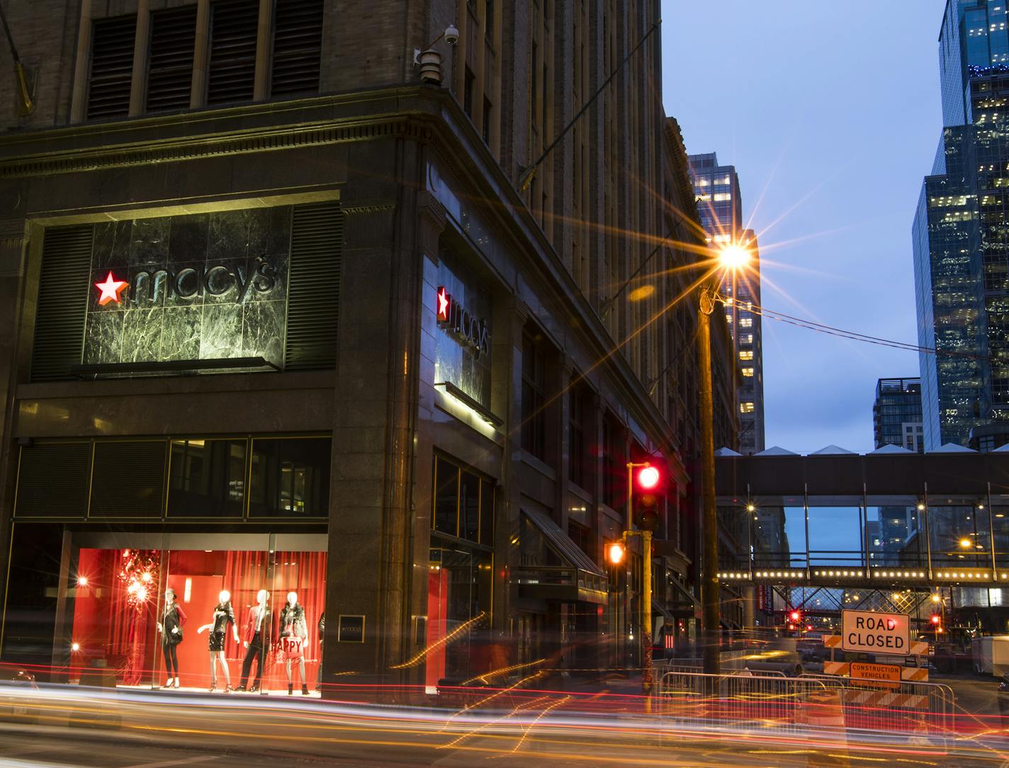 Cars drive past Macy's on S. 8th Street and Nicollet Mall in downtown Minneapolis. ] (Leila Navidi/Star Tribune) leila.navidi@startribune.com BACKGROUND INFORMATION: Macy's in downtown Minneapolis seen in a long exposure photograph on Thursday, December 1, 2016. Rumor that Macy's in downtown Minneapolis will close this year.