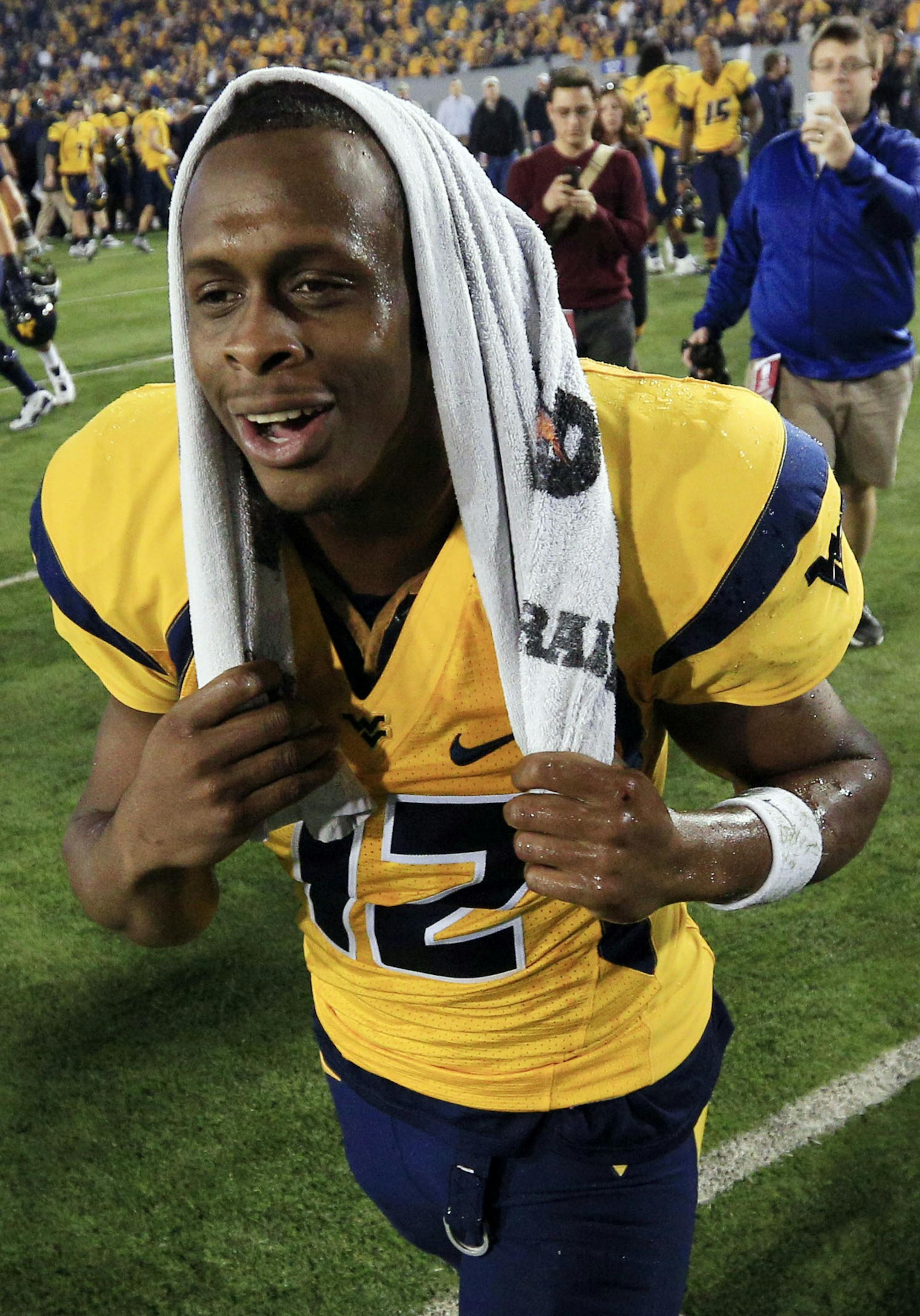 West Virginia quarterback senior Geno Smith dropped into the second round before being selected by the New York Jets.