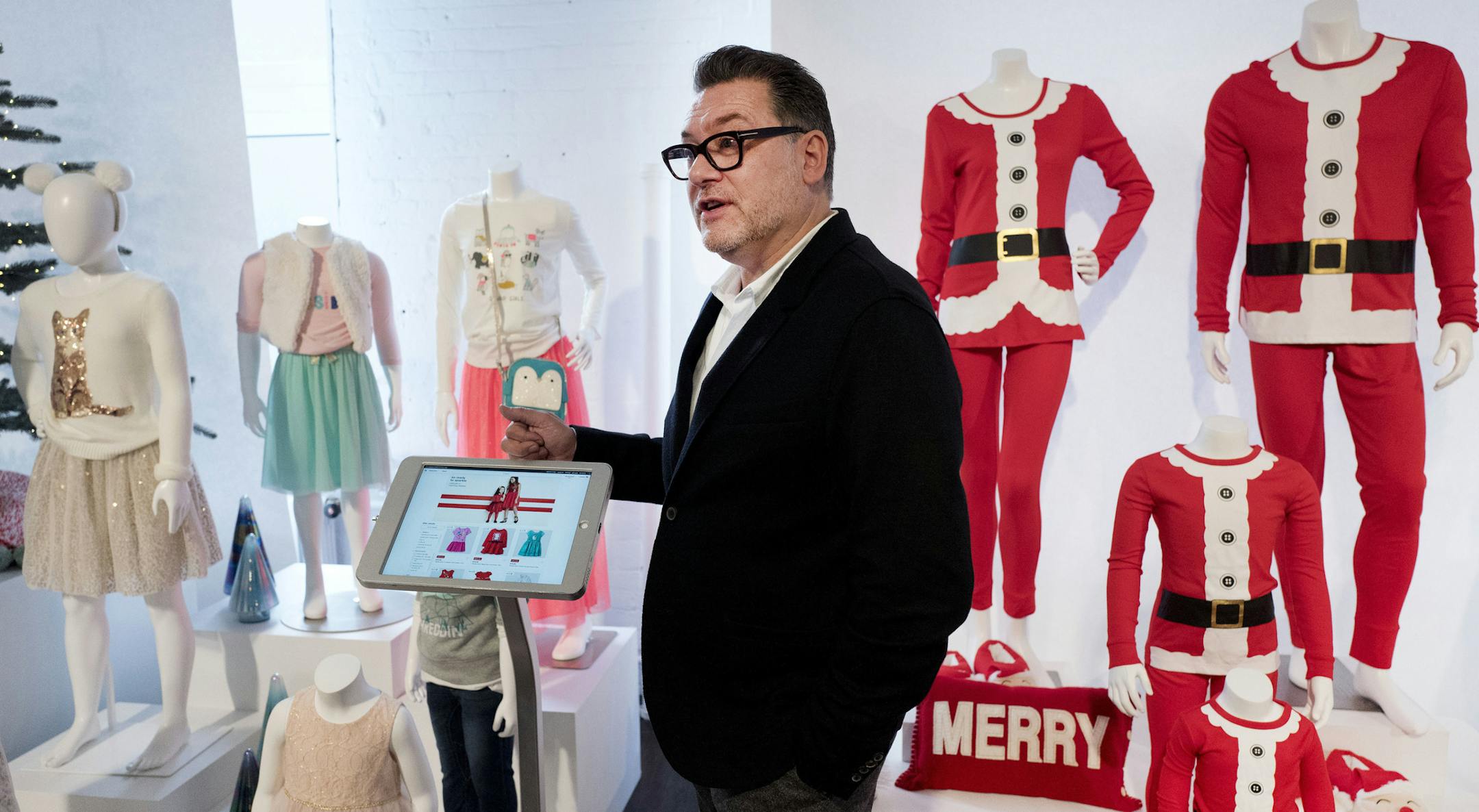 FILE - In this Oct. 25, 2016, file photo, Mark Tritton, executive vice president and chief merchandising officer for Target, discusses some of the holiday products to be offered by the retailer in New York. Struggling home goods chain Bed Bath & Beyond has named Target's former chief merchandising officer Tritton to be its new CEO and president. He will assume the top role on Nov. 4, 2019, succeeding interim CEO Mary A. Winston. (AP Photo/Mark Lennihan, File)