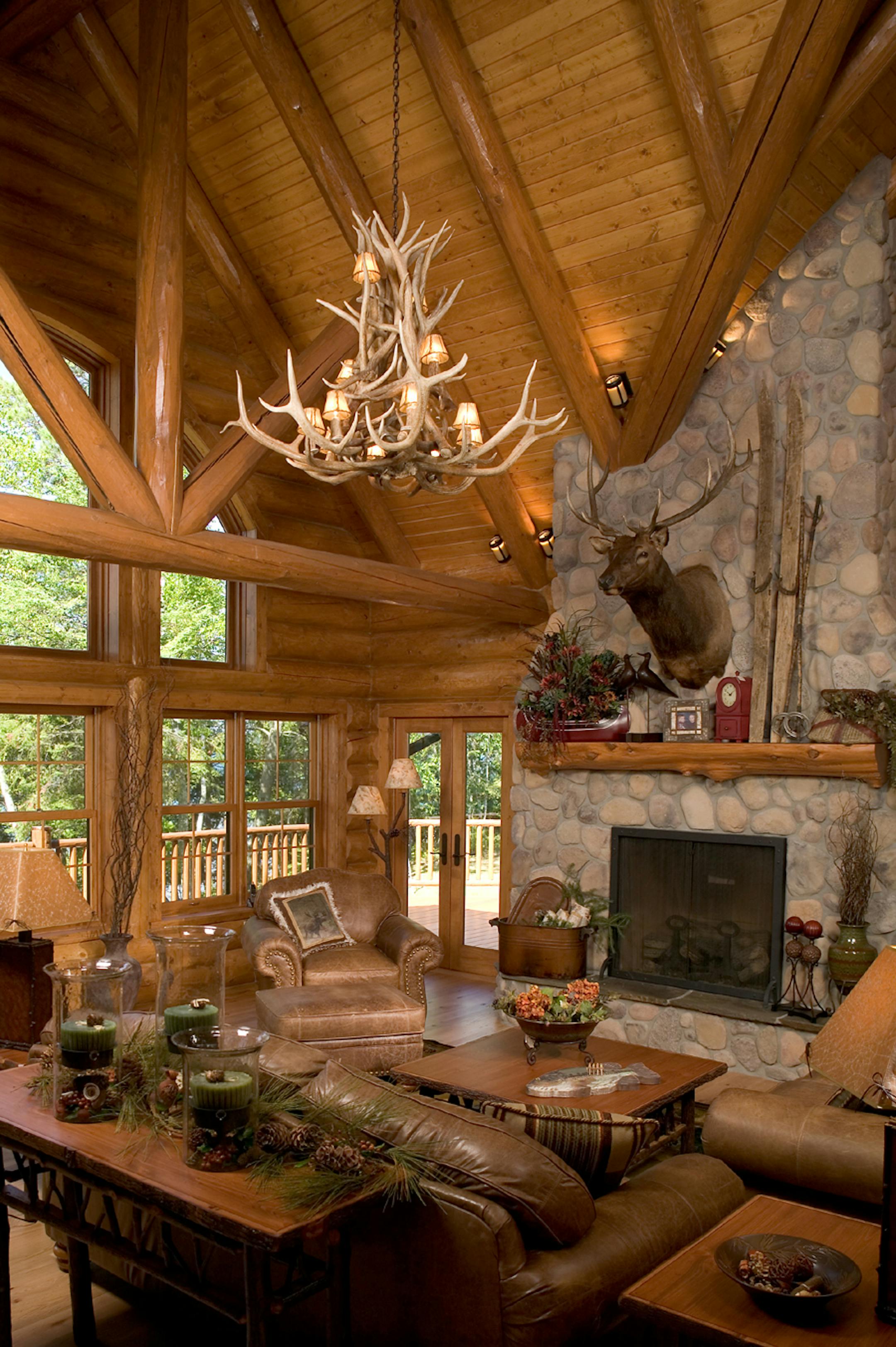 This log cabin won an award for its builder, Kuepers Construction of Brainerd. The family room has floor-to-ceiling windows with views of Christmas Point.