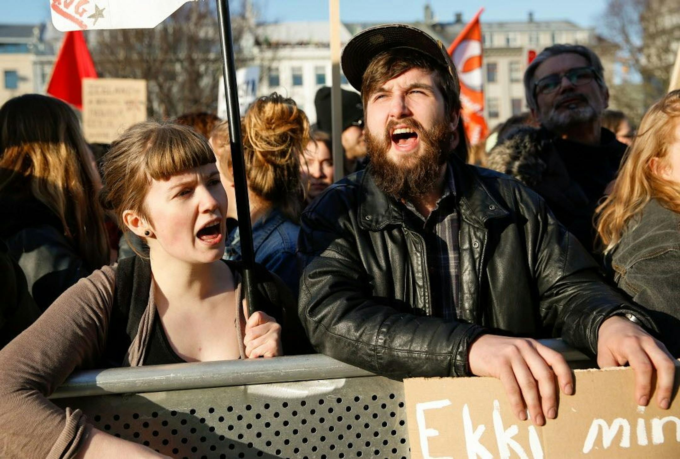 People gather to demonstrate against Iceland's prime minister, in Reykjavik on Monday April 4, 2016. Iceland's prime minister insisted Monday he would not resign after documents leaked in a media investigation allegedly link him to an offshore company that could represent a serious conflict of interest, according to information leaked from a Panamanian law firm at the center of an international tax evasion scheme.