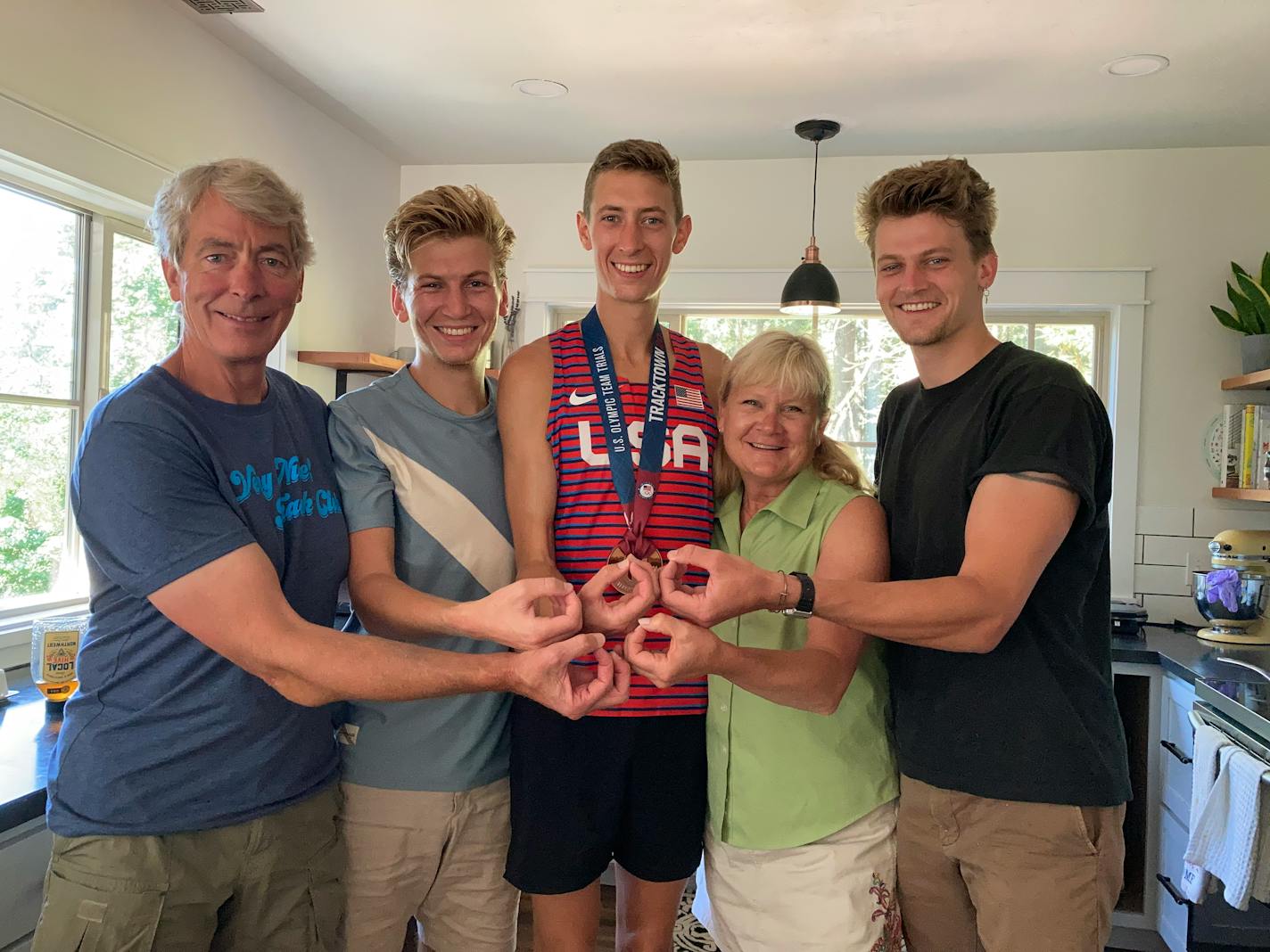 Time for Olympic rings: The Ferlics, from left: Mike, Evan, Mason, Char and Nolan.