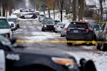 Police taped off the street at the scene of an officer involved shooting Friday in the 3700 block of Morgan Avenue North in north Minneapolis.