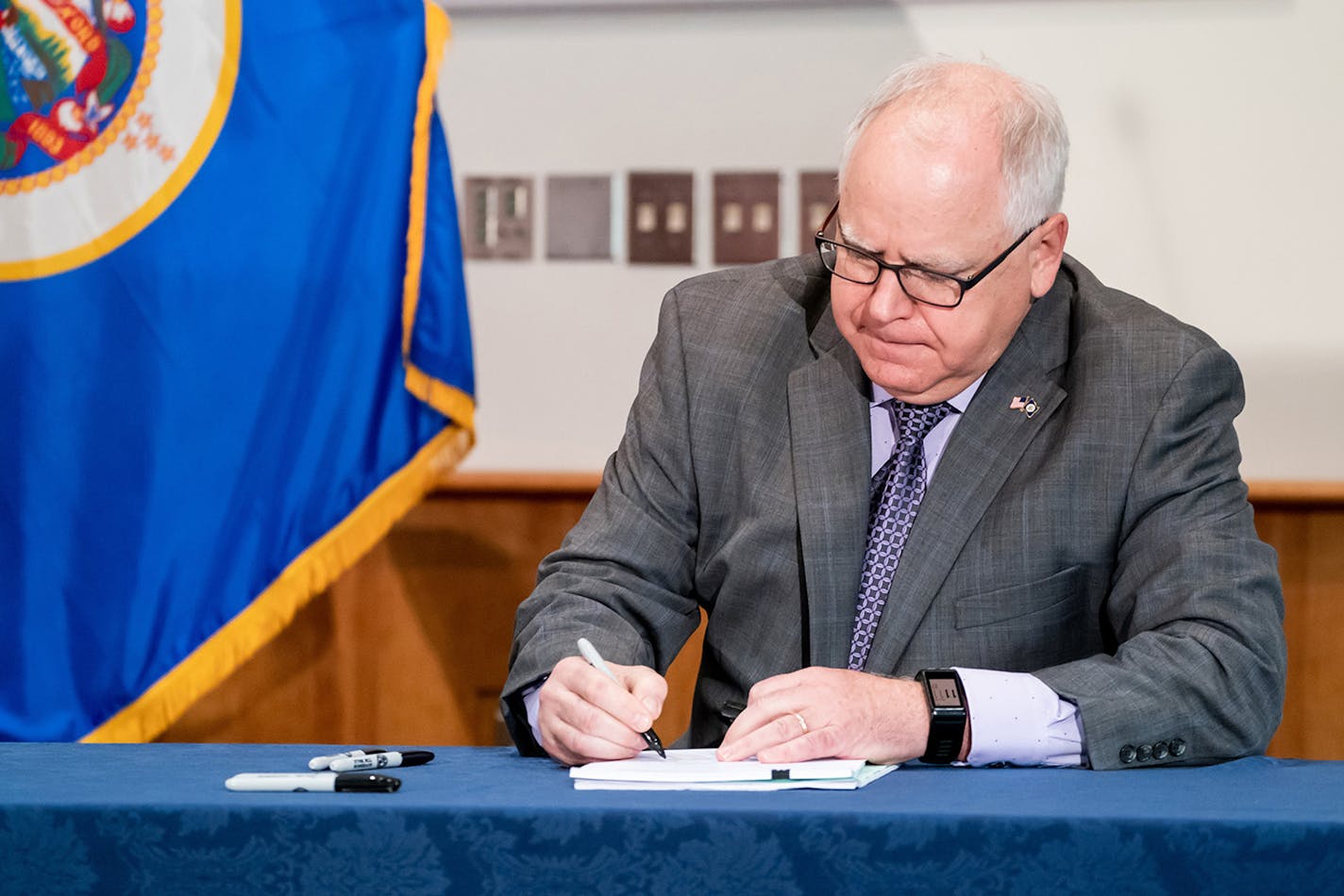 Minnesota Gov. Tim Walz signs into law a sweeping package of police accountability measures Thursday, July 23, 2020. (Glen Stubbe/Minneapolis Star Tribune/TNS) ORG XMIT: 1802551