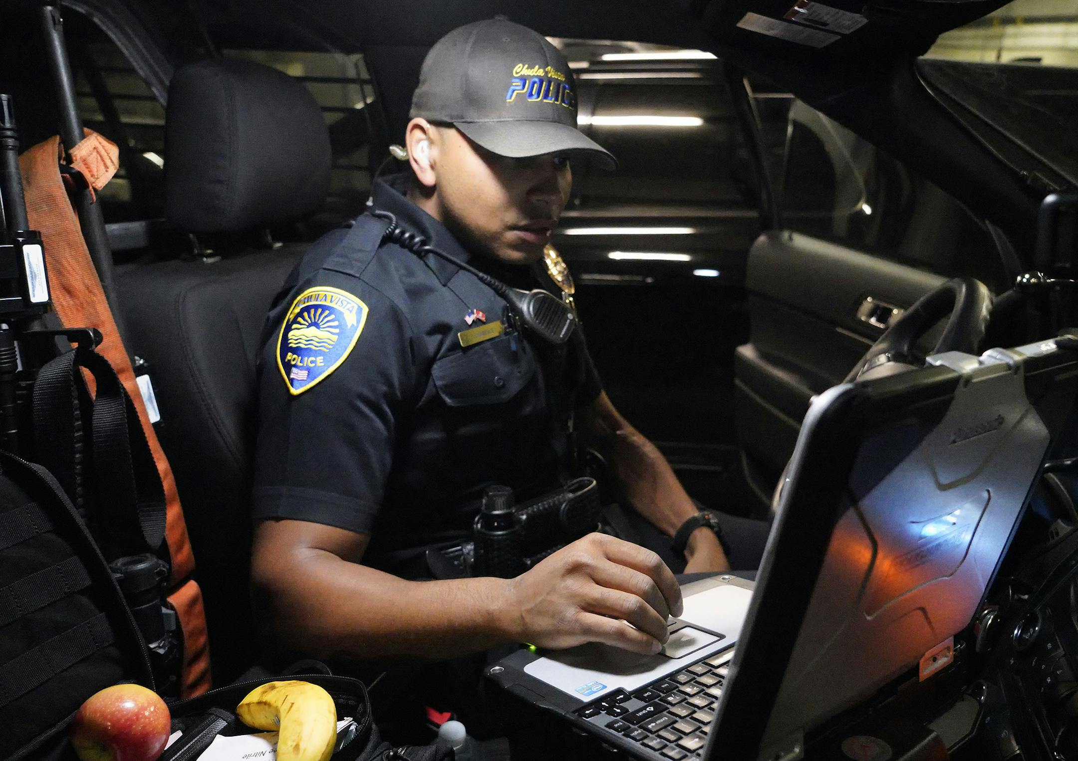 Christopher Lawrence gets his patrol car readied before roll call. Christopher Lawrence a former Marine who served in Iraq was struck by an IED and eventually lost his leg. Since then he has been training and currently works as an officer with the Chula Vista Police Department.(Nelvin C. Cepeda/San Diego Union-Tribune/TNS) ORG XMIT: 1228705