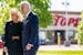President Joe Biden and first lady Jill Biden pay their respects to the victims of Saturday’s shooting at a memorial across the street from a Tops s