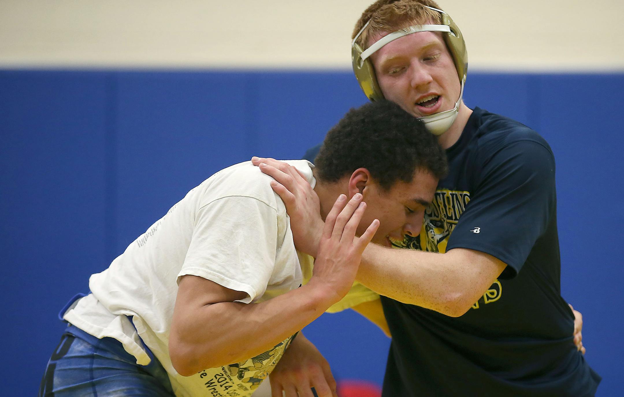 Totino-Grace wrestlers including Jared Florell, left, and Lance Benick, practiced Thursday, February 19, 2015 in Fridley, MN. ] (ELIZABETH FLORES/STAR TRIBUNE) ELIZABETH FLORES • eflores@startribune.com