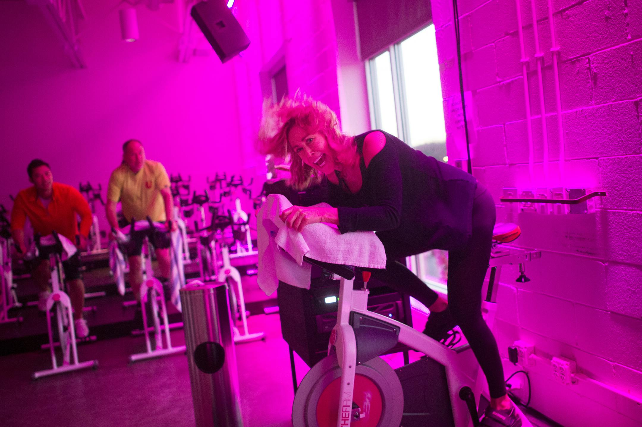 Kelly Miyamoto lead an hour-long, and very loud, spin class at The Firm Tuesday night. ] (AARON LAVINSKY/STAR TRIBUNE) aaron.lavinsky@startribune.com Kelly Miyamoto's spin class was photographed at The Firm on Tuesday, Nov. 10, 2015 in Minneapolis. We check into complaints that the soundtrack for fitness classes at gyms are just TOO LOUD! Health experts say the cranked-up volume is hurting all of us.