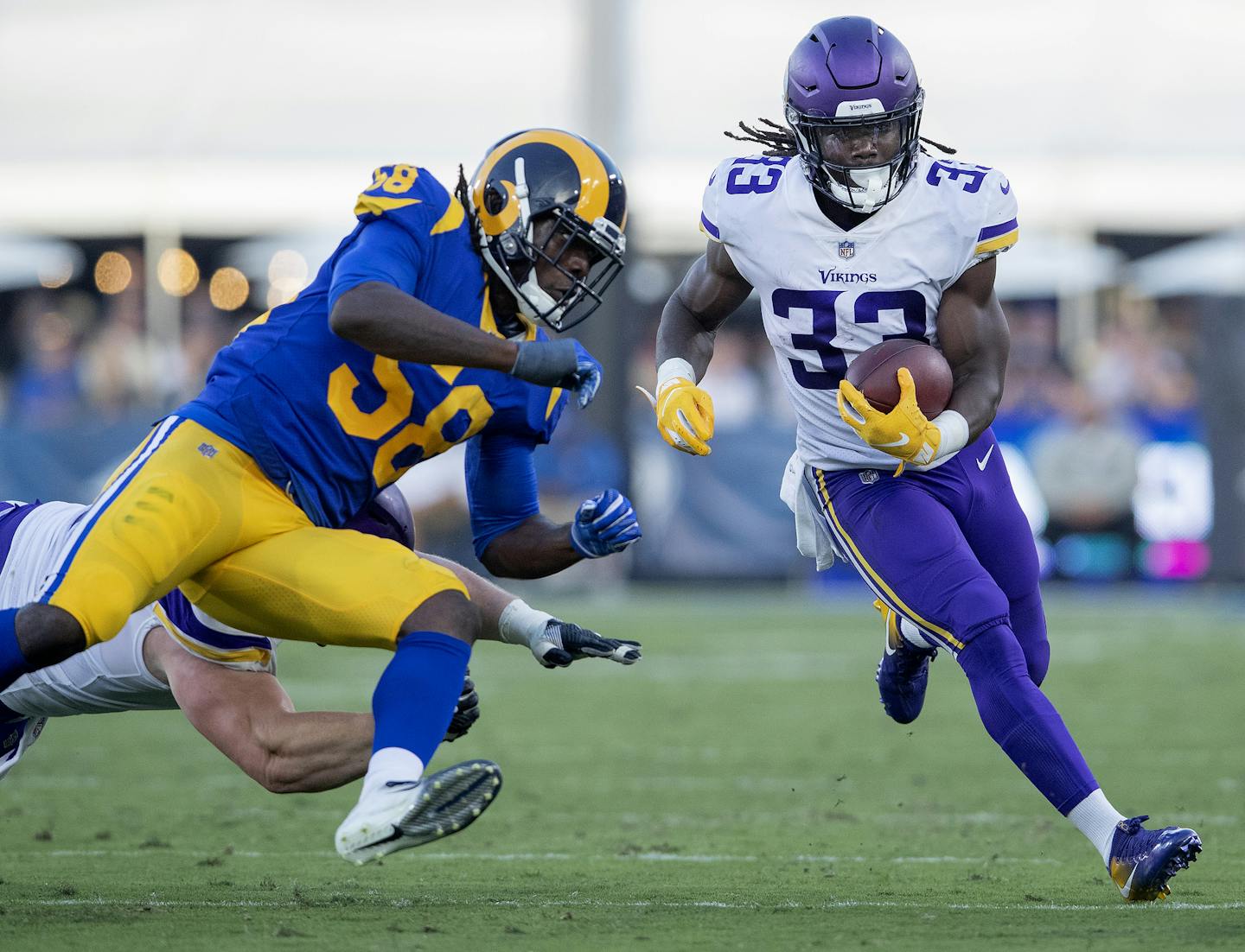 Dalvin Cook (33) during a run in the first quarter. ] CARLOS GONZALEZ &#xef; cgonzalez@startribune.com &#xf1; September 2, 2018, Los Angeles, CA, LA Memorial Coliseum, NFL, Minnesota Vikings vs. Los Angeles Rams