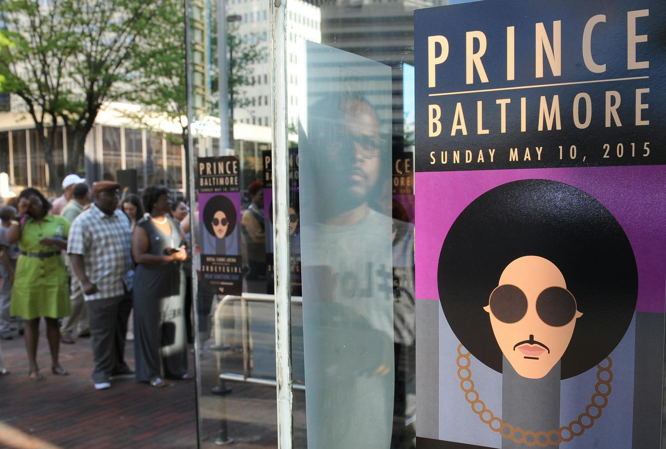 Fans line up outside Royal Farms Arena before Prince's Baltimore concert Sunday, May 10, 2015. (Jerry Jackson/The Baltimore Sun via AP)