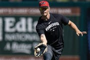 Right fielder Max Kepler chases down a ball during Twins spring training last month. After concern over a potential injury on Wednesday, an MRI found 