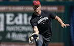 Right fielder Max Kepler chases down a ball during Twins spring training last month. After concern over a potential injury on Wednesday, an MRI found 