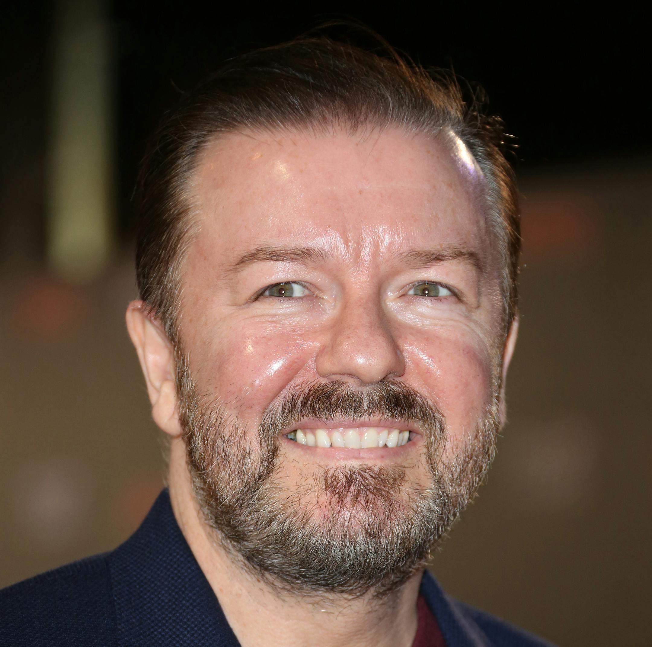 FILE - In this Feb. 26, 2015 file photo, Ricky Gervais poses for photographers upon arrival at the House of Cards season 3 World Premiere at the Empire Cinema in central London. 2015 Emmy nominees all have their favorite shows, and some have imagined what it might be like to hang out in one of the alluring worlds of the small screen. ìOK, ëGame of Thrones.í Oh my God. Give me a sword. Give me a sword and a dragon. I will sort out some stuff in that fictional world.î said Gerv