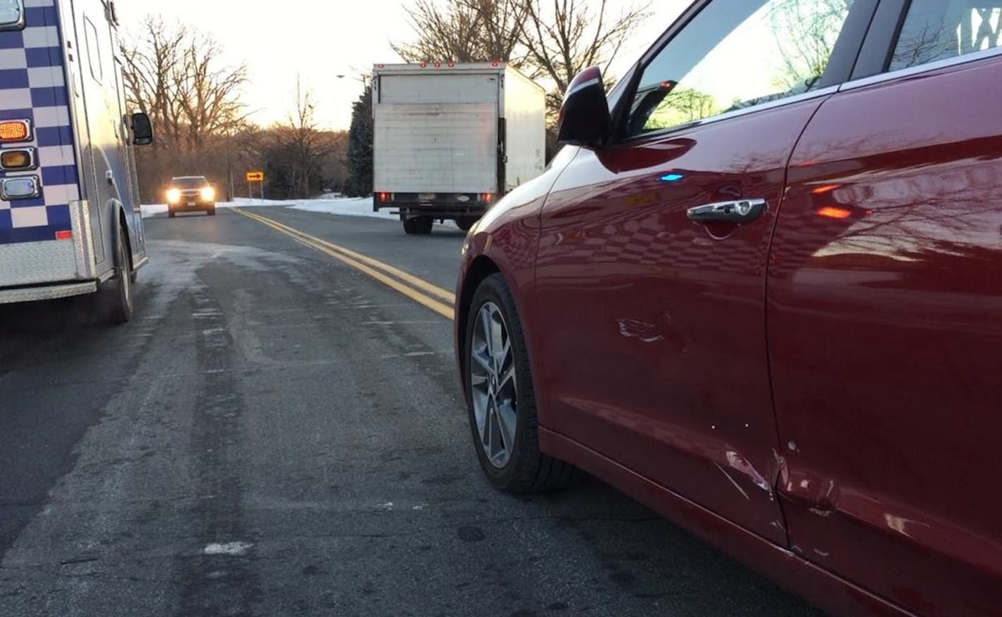 Scrape marks were left on the car in the aftermath of a truck driver using his vehicle to bring the car to a safe rest.