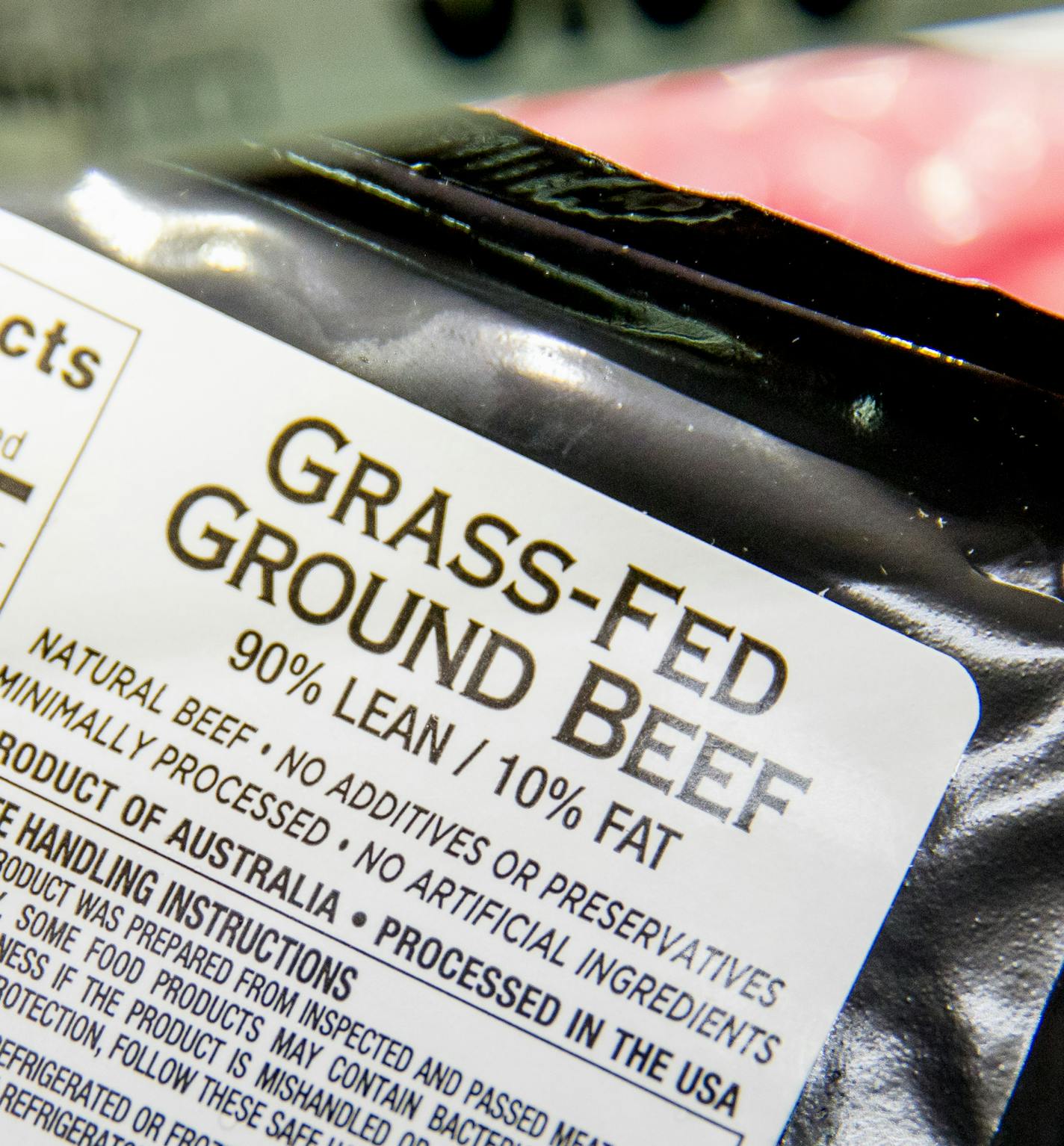 Meat labels are seen at a grocery store in Washington, Tuesday, May 19, 2015. A House committee is moving swiftly to get rid of labels on packages of meat that say where the animals were born, raised and slaughtered. (AP Photo/Andrew Harnik)