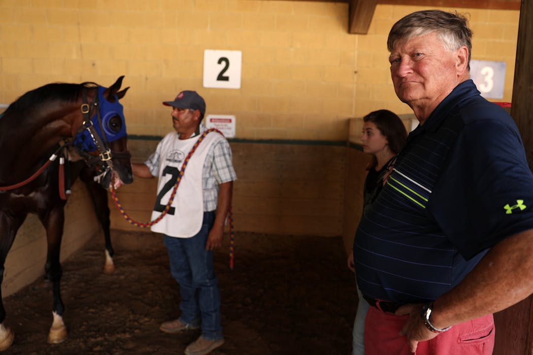 Pete Mattson stood in the paddock with Fireman Oscar before Saturday's Minnesota Derby.
