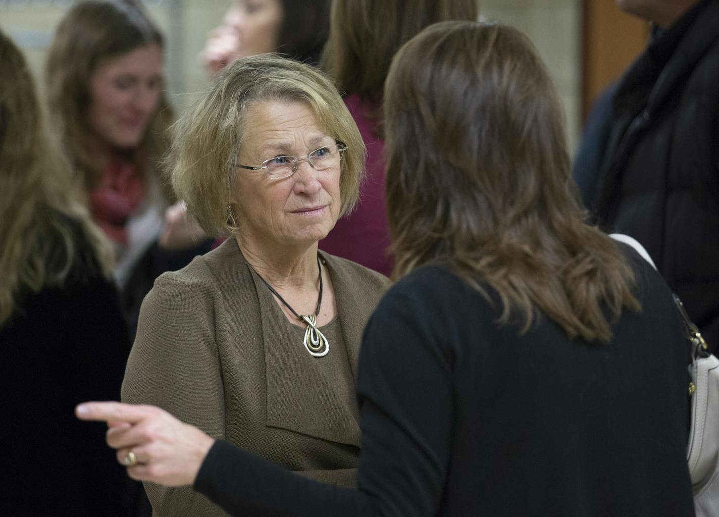 Patty Wetterling, left, met with residents of Paynesville, where a series of assaults in the 1980s has been linked to her son's abduction.