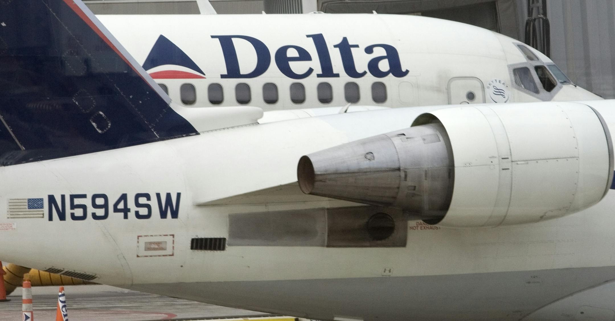 A Delta Air Lines plane at Dulles International Airport in Virginia. Delta and Northwest Airlines could announce a merger as early as Tuesday.