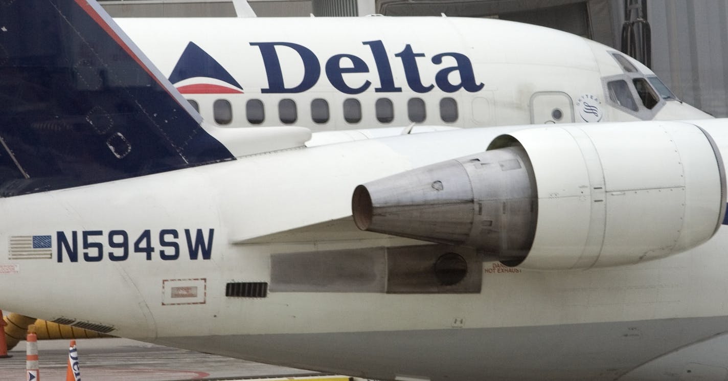 A Delta Air Lines plane at Dulles International Airport in Virginia. Delta and Northwest Airlines could announce a merger as early as Tuesday.