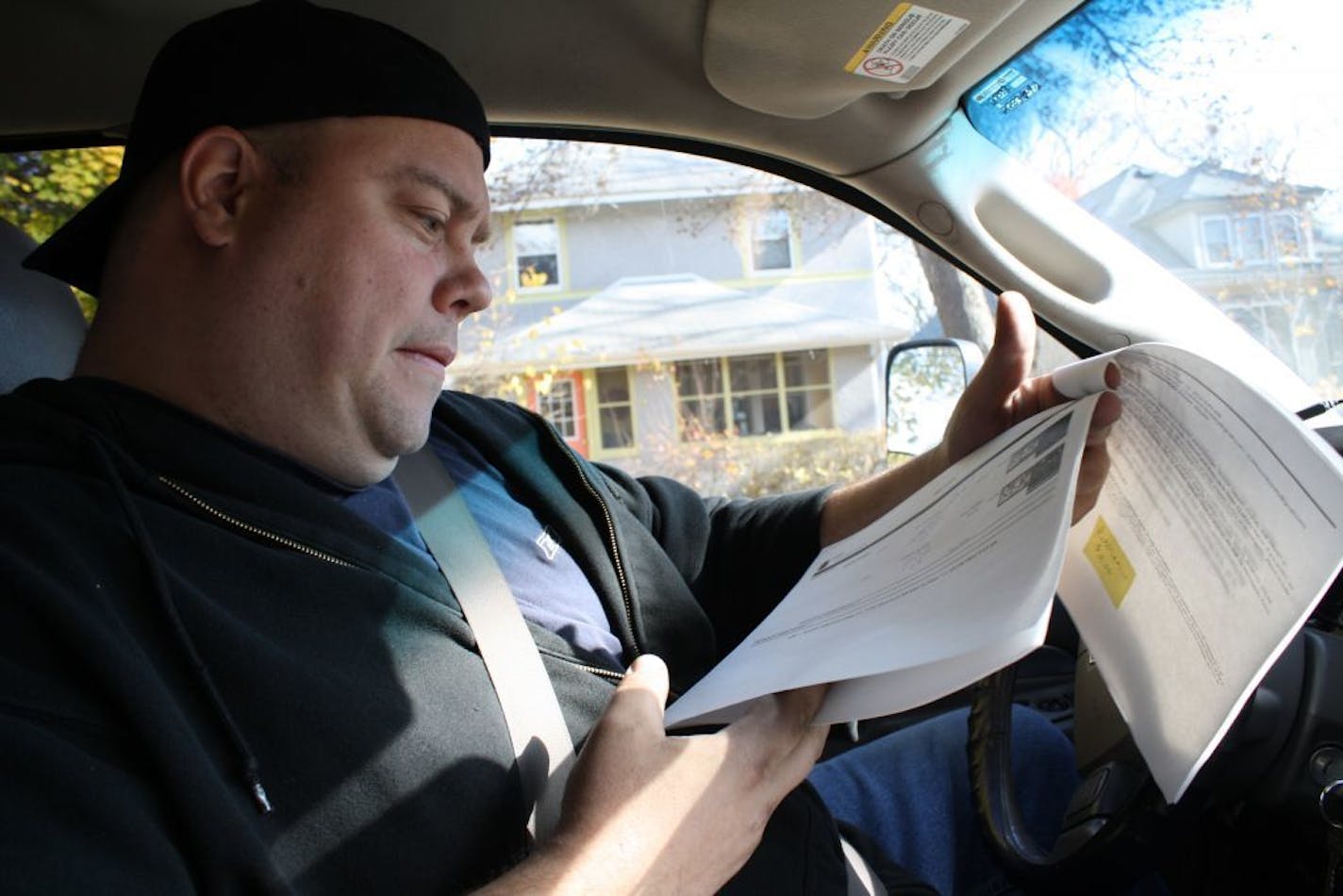 ERIC ROPER/STAR TRIBUNE. Alex Peterson, owner of 11th Hour Recovery, using police license plate data to find cars in Minneapolis.