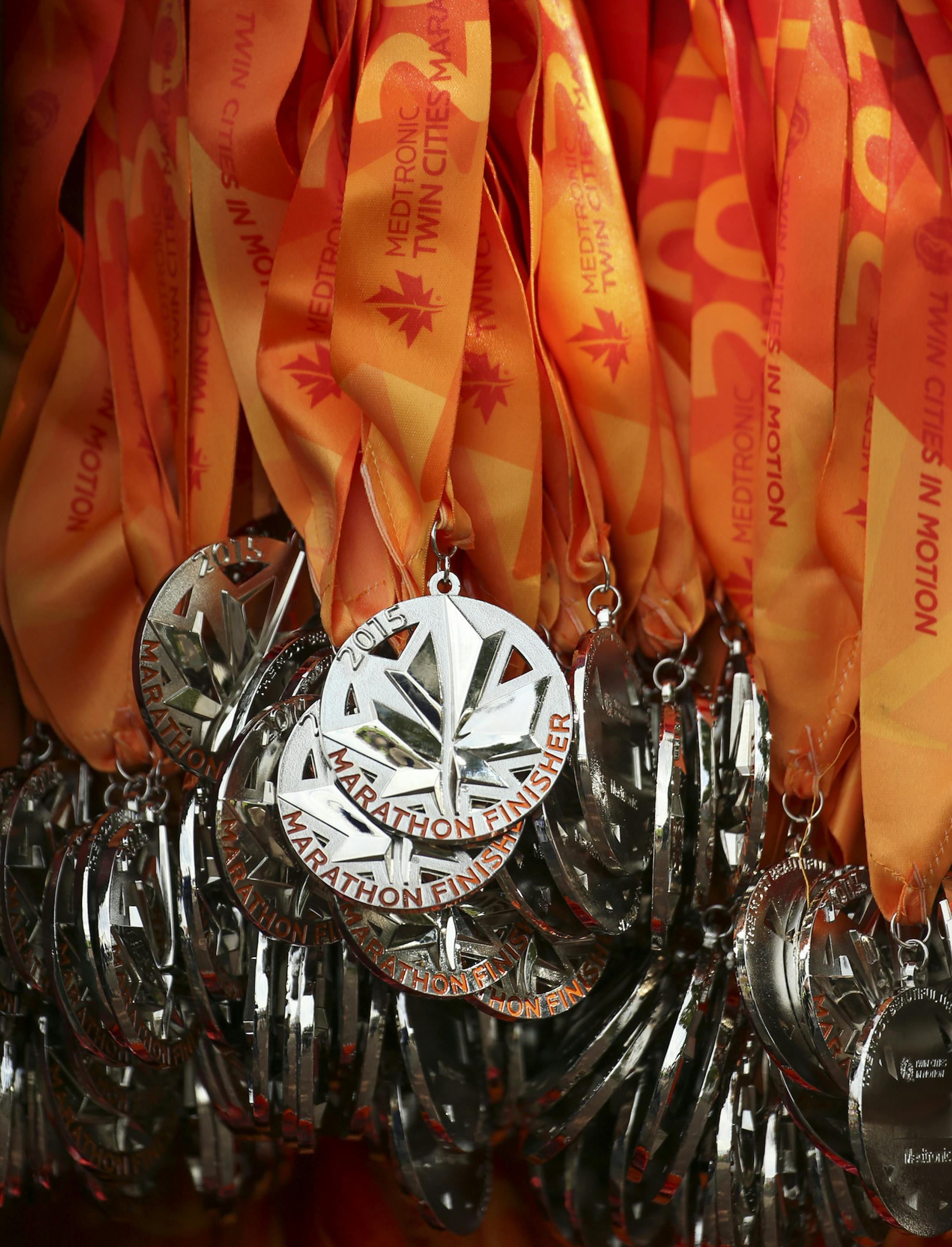 Medals awaited finishers Sunday morning. ] JEFF WHEELER ï jeff.wheeler@startribune.com More than 11,000 runners started the Twin Cities Marathon Sunday morning, October 4, 2015 in Minneapolis.