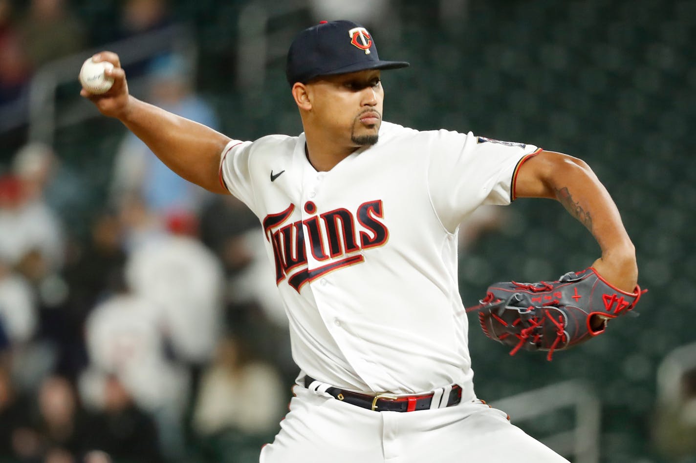 Minnesota Twins relief pitcher Jhoan Duran throws to the Seattle Mariners in the ninth inning of a baseball game Monday, April 11, 2022, in Minneapolis. (AP Photo/Bruce Kluckhohn)