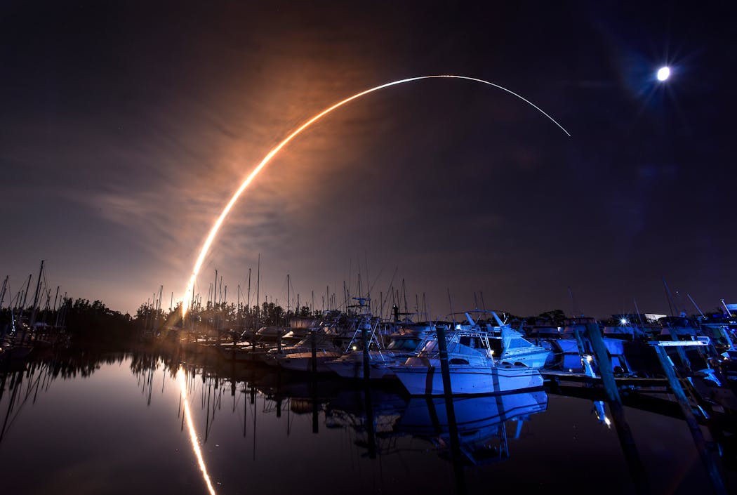 NASA's new moon rocket lifted off from the Kennedy Space Center, Nov. 16, 2022, as seen from Harbortown Marina on Merritt Island, Fla.