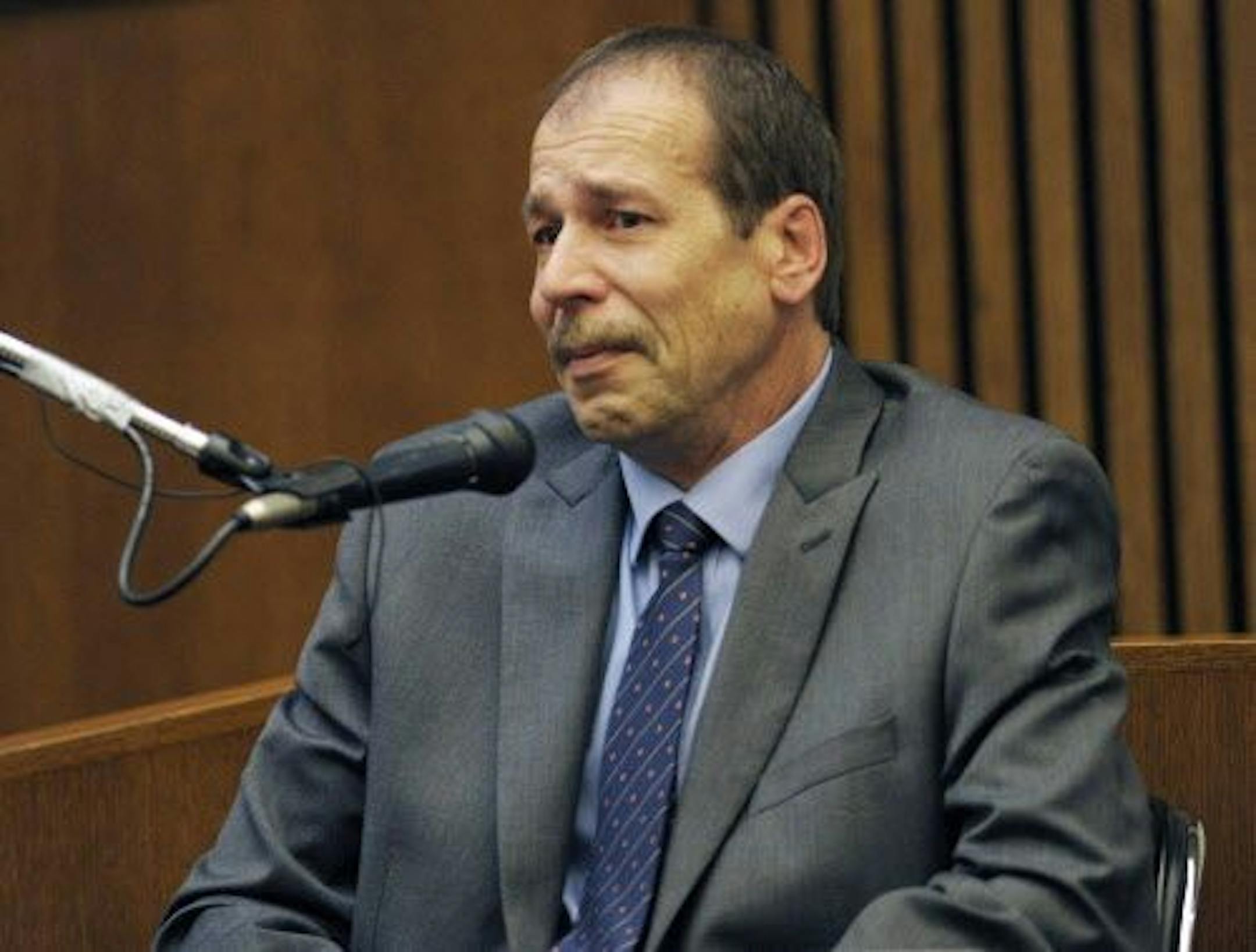 Theodore Wafer, of Dearborn Heights, Mich., testifies in his own defense during his trial for the Nov. 2, 2013, killing of Renisha McBride in Detroit.