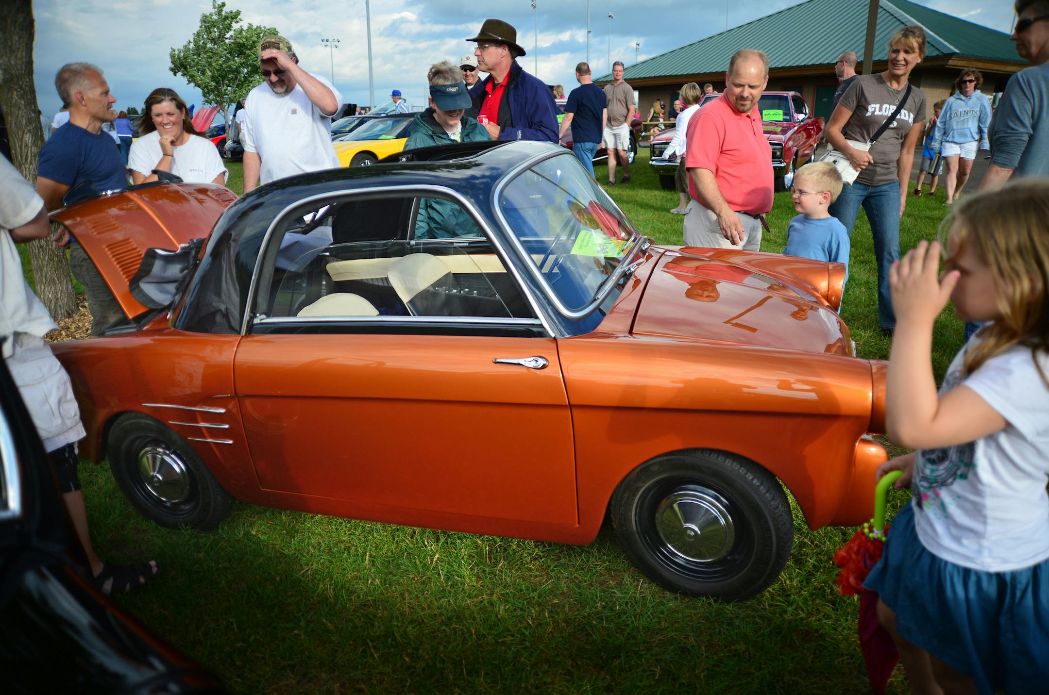 Apple Valley Freedom Days car and motorcycle show was held at Johnny Cake Ridge Park East on Friday June 28, 2013. This tiny car is an Italian Autobianchi, Bianchina made in1960 and was a crowd favorite during the show.] Richard.Sennott@startribune.com Richard Sennott/Star Tribune Apple Valley Minnesota Friday 6/28/13) ** (cq)