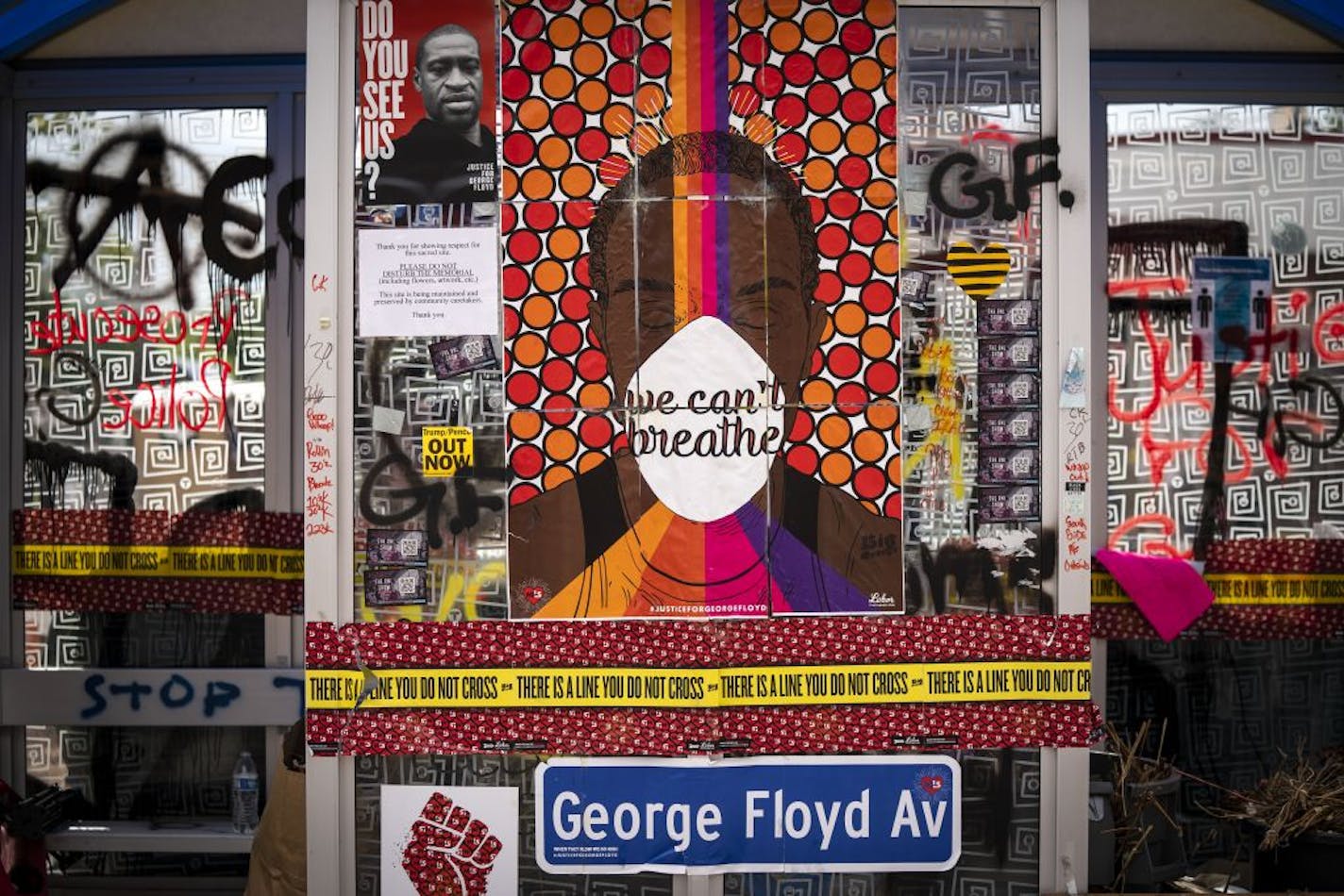 The bus stop at 38th and Chicago is part of a memorial to George Floyd outside Cup Foods, in Minneapolis on Thursday, June 25, 2020. Floyd, a Black handcuffed man, died May 25 after Derek Chauvin, a white officer, pressed his knee into Floyd's neck for nearly 8 minutes and held it there even after Floyd said he couldn't breathe and stopped moving.