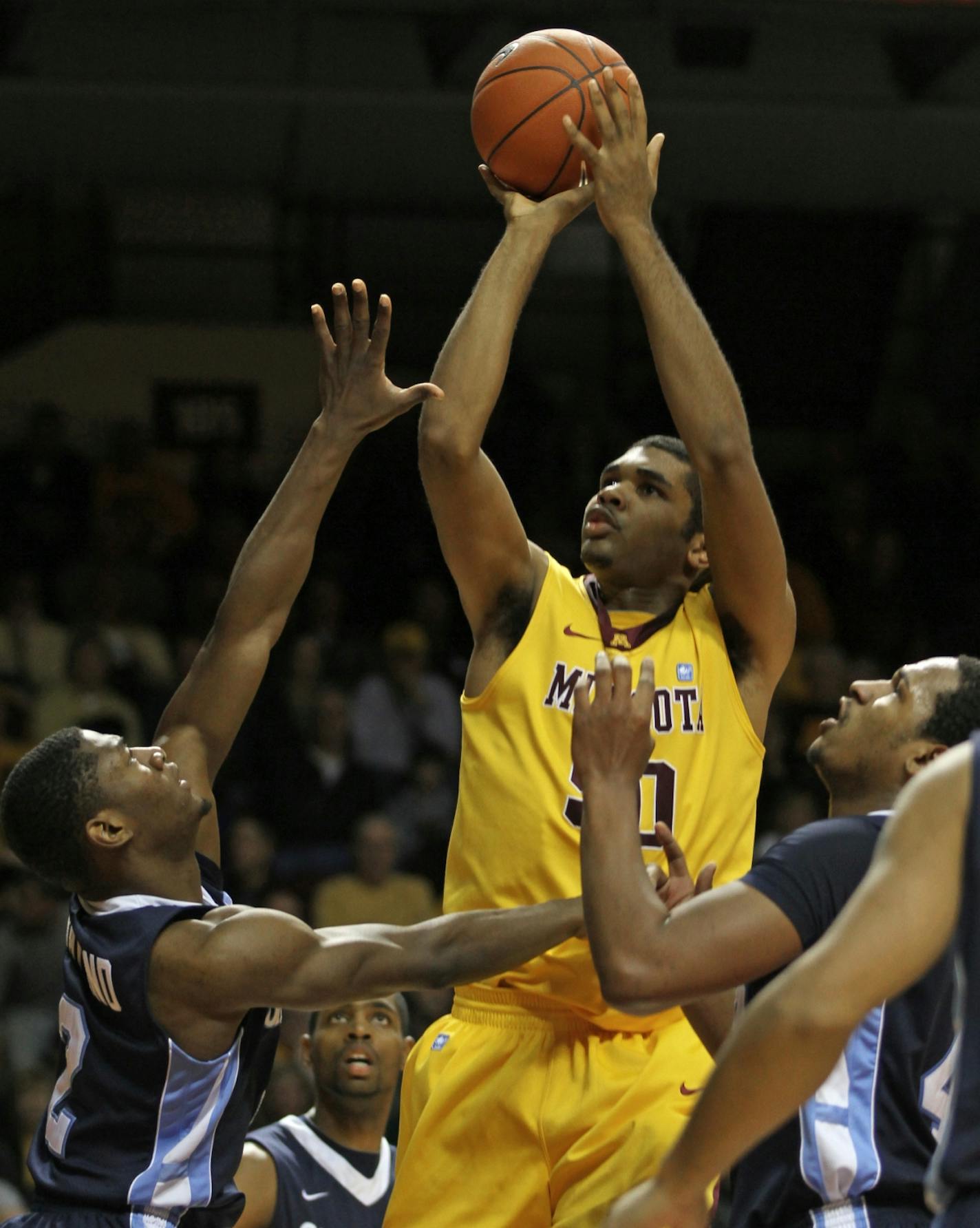 Minnesota Gophers vs. Saint Peter's on 12/10/11. (center) Minnesota's Ralph Sampson lll was double teamed as he drove to the basket in 2nd half action.