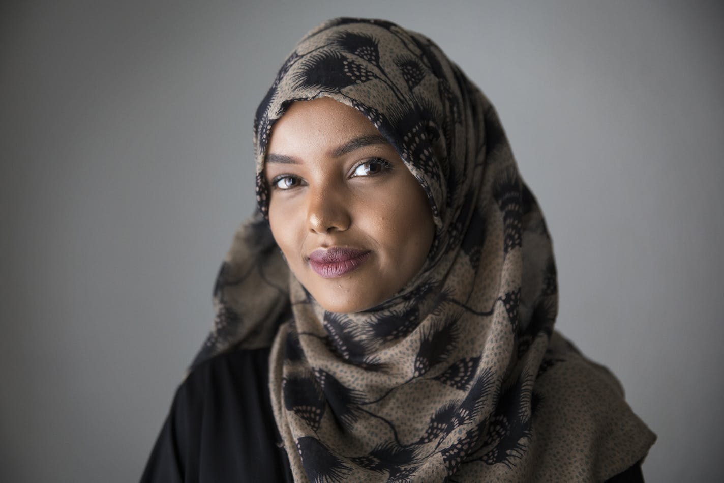 Somali-American Halima Aden, 19, posing for a photo in her home in Waite Park, will become the first woman to compete for the title of Miss Minnesota USA. ] (Leila Navidi/Star Tribune) leila.navidi@startribune.com BACKGROUND INFORMATION: At home with Halima Aden in Waite Park on Wednesday, November 23, 2016. Somali-American Halima Aden, 19, will become the first woman to compete for the title of Miss Minnesota USA while wearing a burkini, which she hopes will break barriers for other young Musli