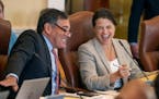 Sen. Rick Bennett, R-Oxford, left, and Assistant Senate Minority Leader Sen. Lisa Keim, R-Dixfield, share a laugh during the morning Senate session We
