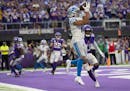 Detroit Lions wide receiver KhaDarel Hodge (18) caught a 2 point conversion over Minnesota Vikings free safety Xavier Woods (23) late in the fourth qu