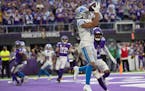 Detroit Lions wide receiver KhaDarel Hodge (18) caught a 2 point conversion over Minnesota Vikings free safety Xavier Woods (23) late in the fourth qu