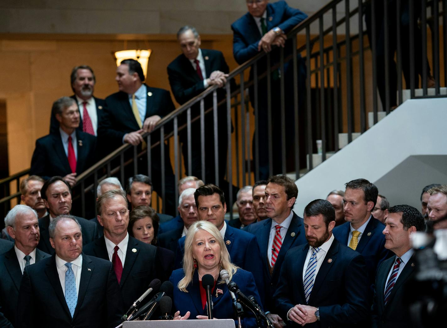 Rep. Debbie Lesko (R-Ariz.) and other House Republicans speak outside the secure room where impeachment investigation interviews are taking place on Capitol Hill in Washington on Wednesday, Oct. 23, 2019. (Erin Schaff/The New York Times)