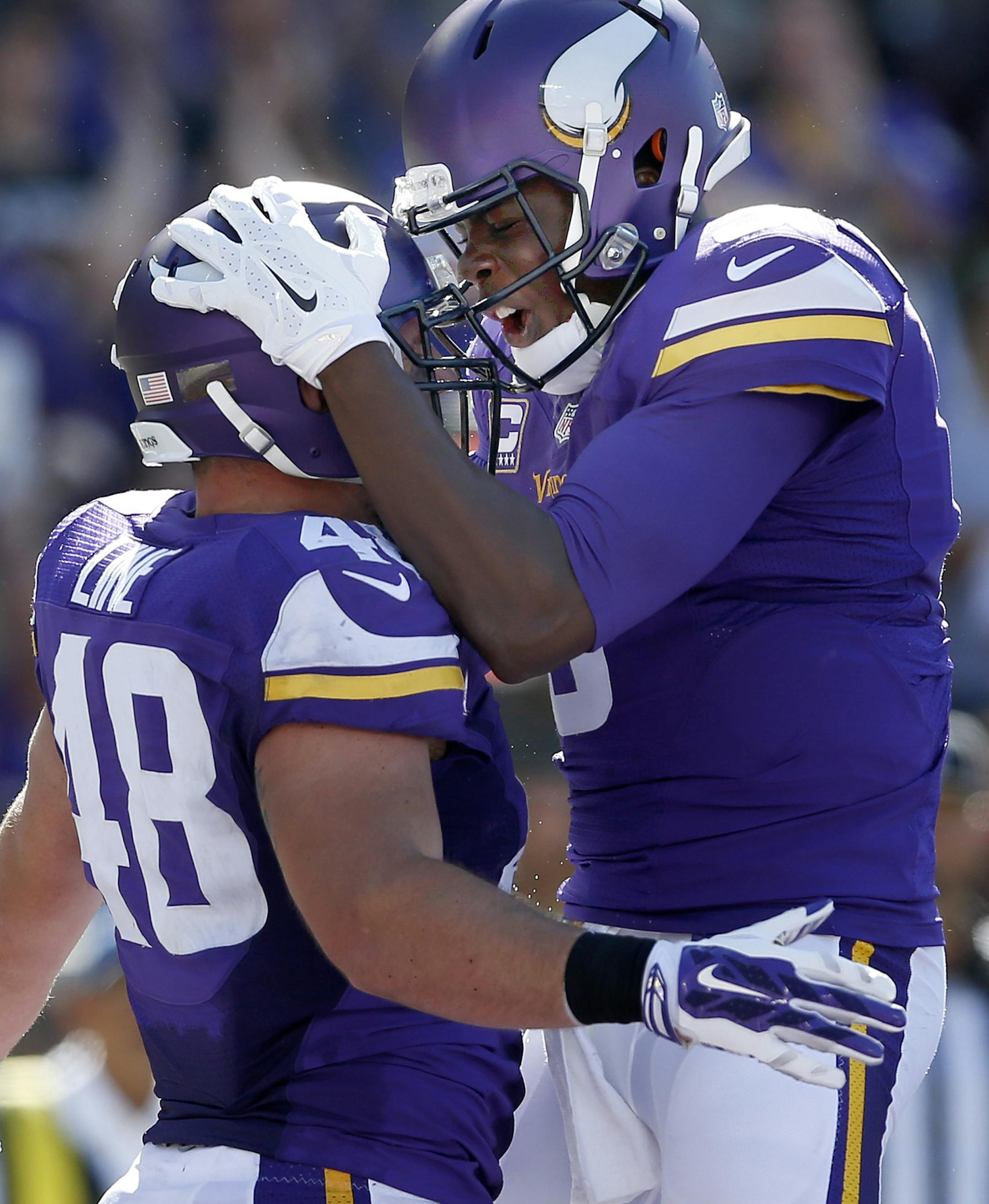 Zach Line (48) celebrated with Teddy Bridgewater (5) after scoring a touchdown in the third quarter. ] CARLOS GONZALEZ &#x2022; cgonzalez@startribune.com - September 27, 2015, TCF Bank Stadium, Minneapolis, MN, NFL, Minnesota Vikings vs. San Diego Chargers
