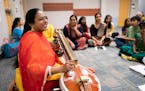 Nirmala Rajasekhar leads practice with her veena. ] MARK VANCLEAVE &#xa5; Musician and composer Nirmala Rajasekhar held a practice session for her stu