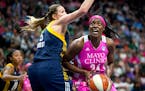 Lynx center Sylvia Fowles looks to shoot against Indiana Fever's Jennifer Hamson in a game last month. Fowles scored 27 points and grabbed 12 rebounds