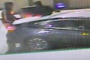 Surveillance images shows what police say are suspects loading a Caribou Coffee safe into a car outside Eden Prairie Center.