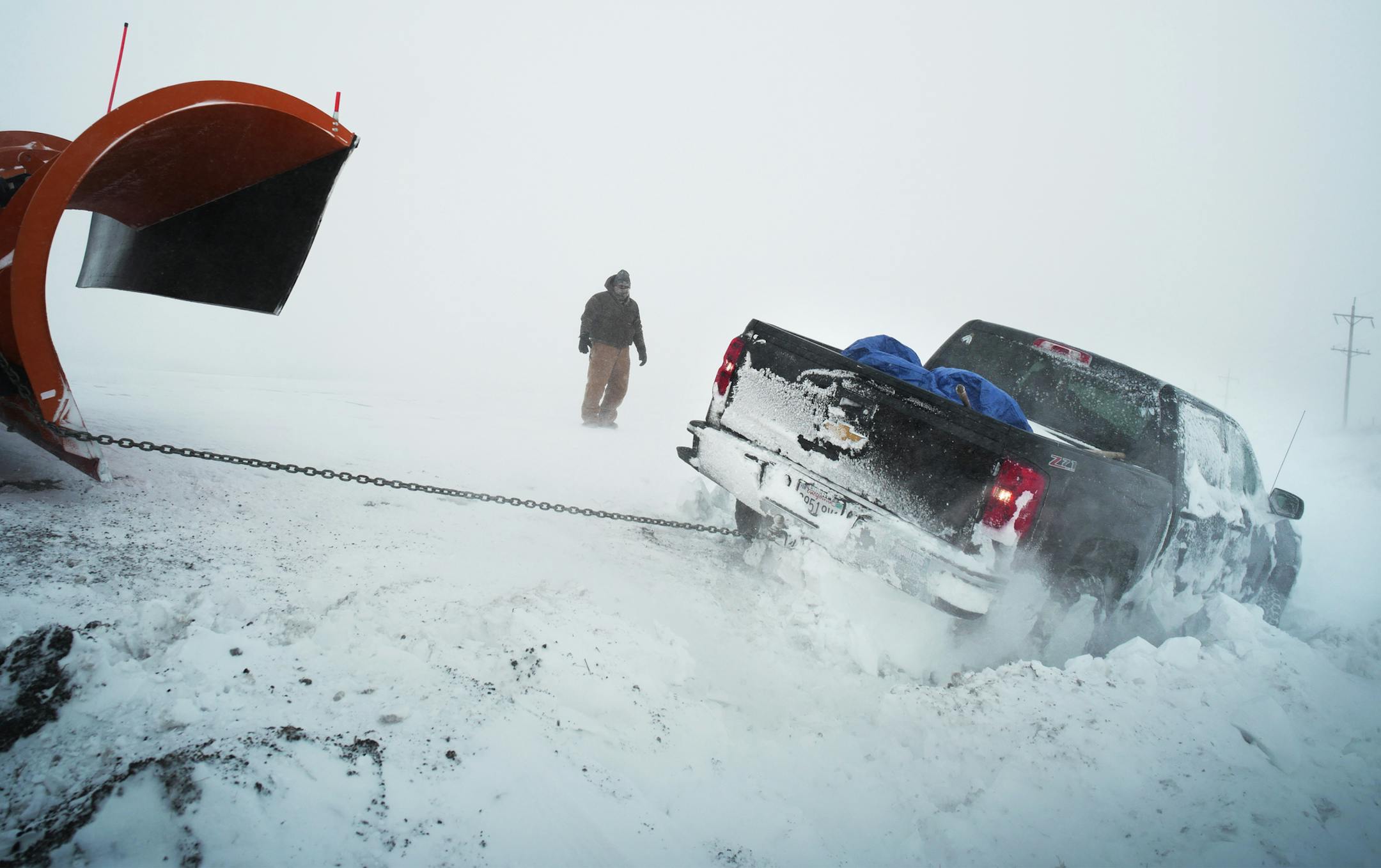 A Samaritan plow driver helped get a truck out of a snowbank on Tuesday near Cannon Ball, North Dakota. ]Veterans tried to stay warm the day after a scheduled march to the blockaded bridge which leads to the DAPL construction site. Because of the blizzard, the focus shifted to keeping veterans warm and fed.Richard Tsong-Taatarii/rtsong-taatarii@startribune