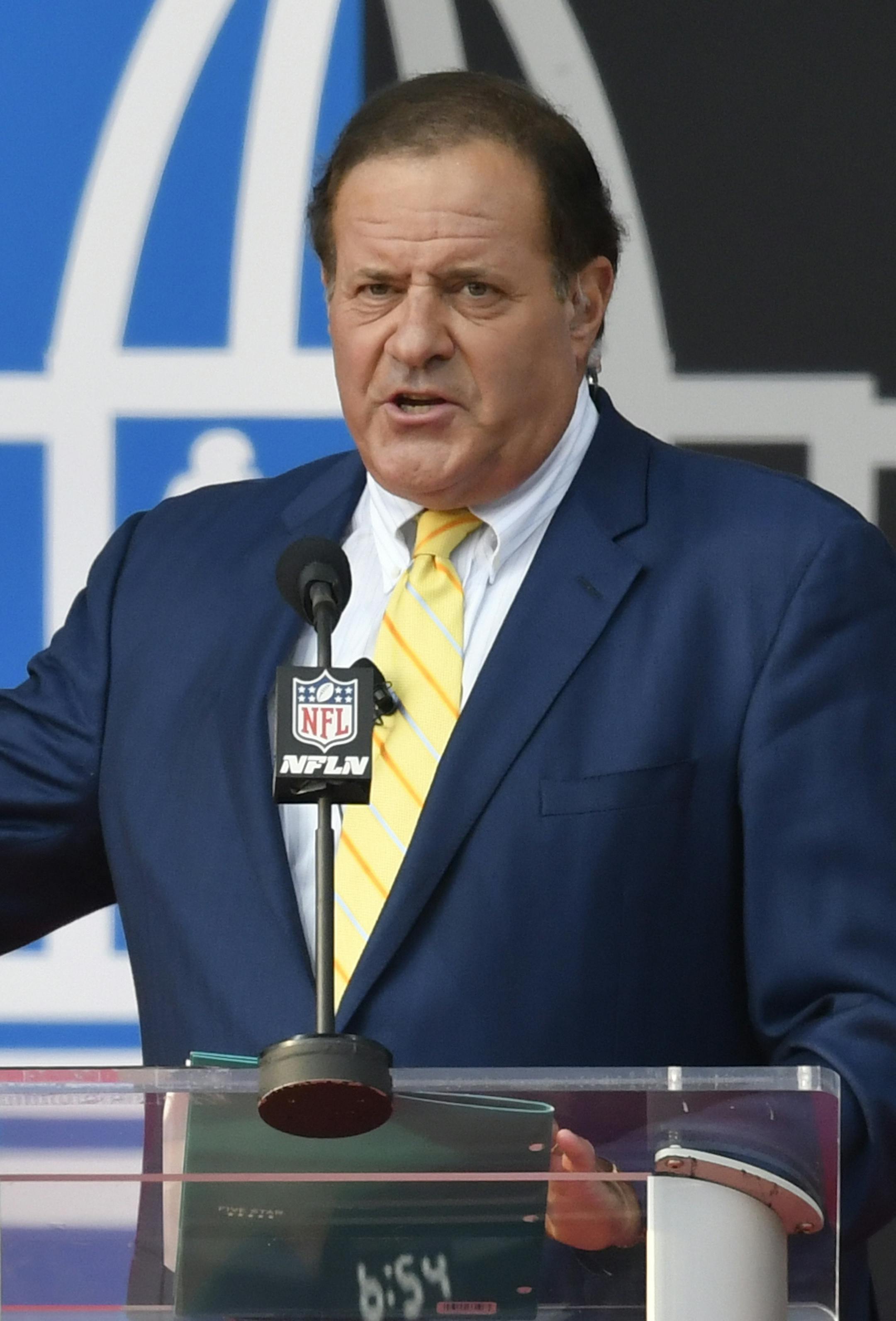 ESPN broadcaster Chris Berman hosts an induction ceremony at the Pro Football Hall of Fame Saturday, Aug. 5, 2017, in Canton, Ohio. (AP Photo/David Richard) ORG XMIT: CDS