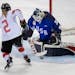USA goalie Maddie Rooney (35) (Andover, MN) blocked a shot by Meghan Agosta (2) on the last attempt of the shootout to win the game.