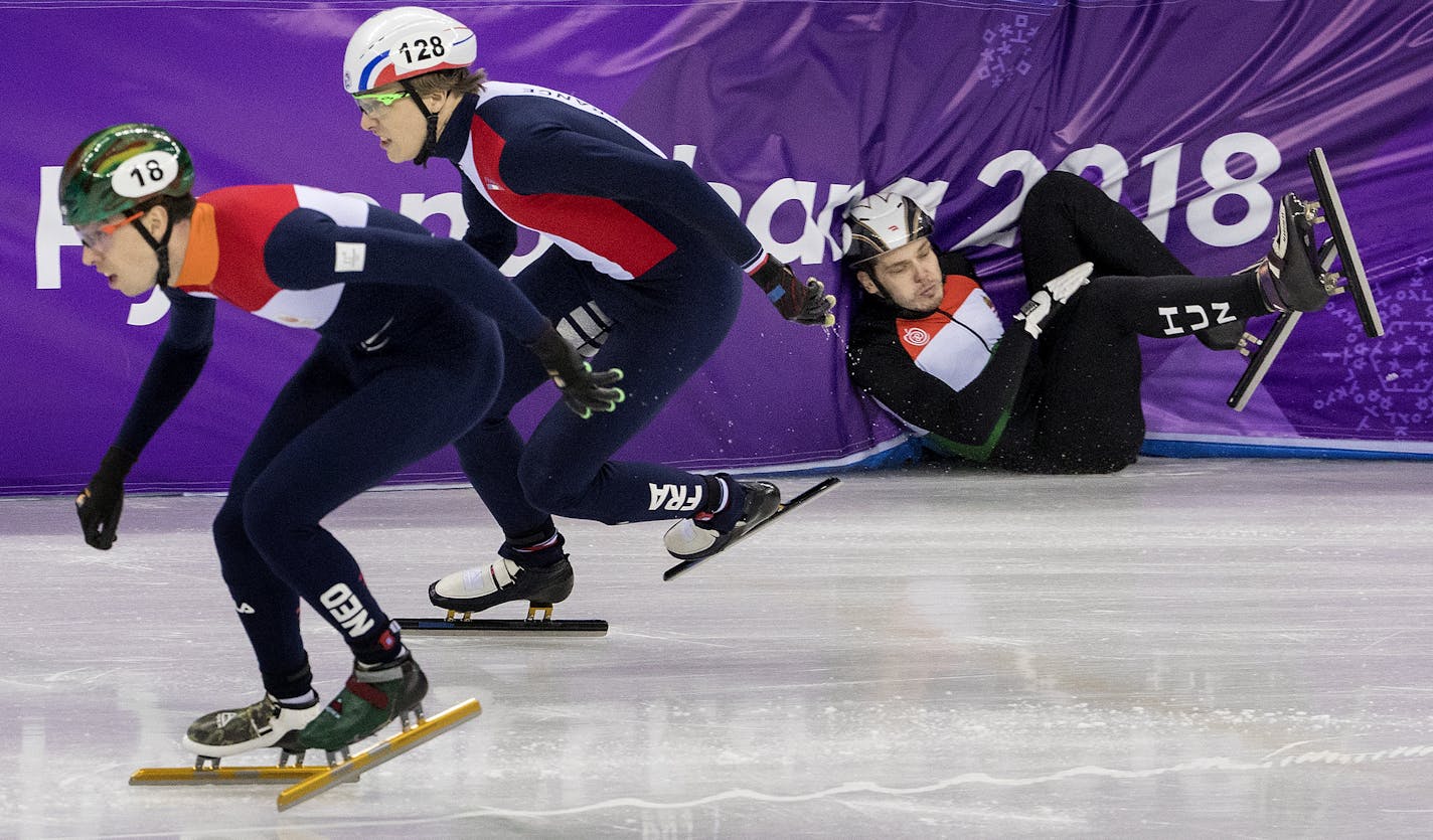 Viktor Knoch of Hungary crashed in the wall during a 500m short track heat.