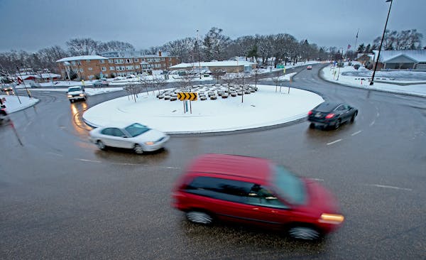 Drivers made their way around the roundabout at 66th & Portland, Wednesday, January 21, 2015 in Richfield, MN. Minnesota drivers can expect to see mor