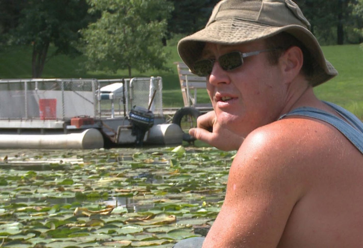 Will St. Sauver searched Goose Lake last year for his missing alligator, Bonnie.