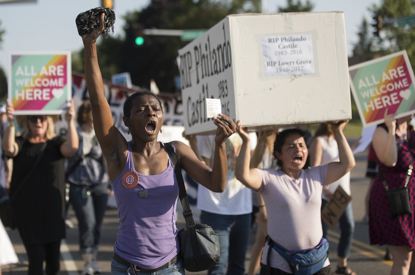 Daphne Brown of New Hope marched for adorable housing down Silver Lake Road to The St. Anthony City Council chambers. St. Anthony City Council members as so passed a resolution to terminate its police contract with Falcon Heights at during Tuesday night's meeting at City Hall July 11, in St. Anthony, MN. ] JERRY HOLT &#xef; jerry.holt@startribune.com