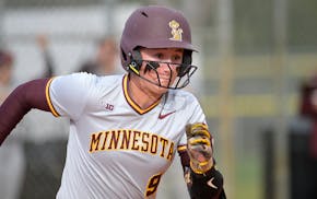 Minnesota's Jess Oakland (9) runs after hitting a pitch during an NCAA college softball game against Western Kentucky, Sunday, Feb. 12, 2023, in Leesb