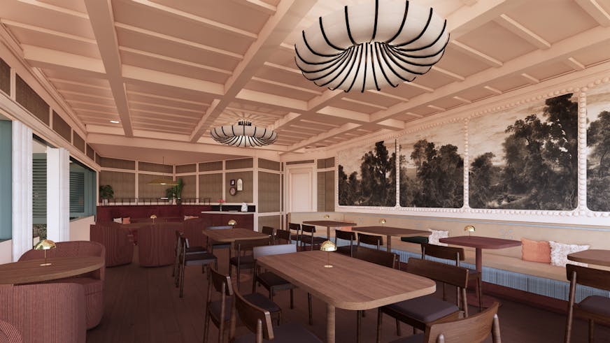 A long room with wood tables, a bar at the back and walls with prints of black and white trees.